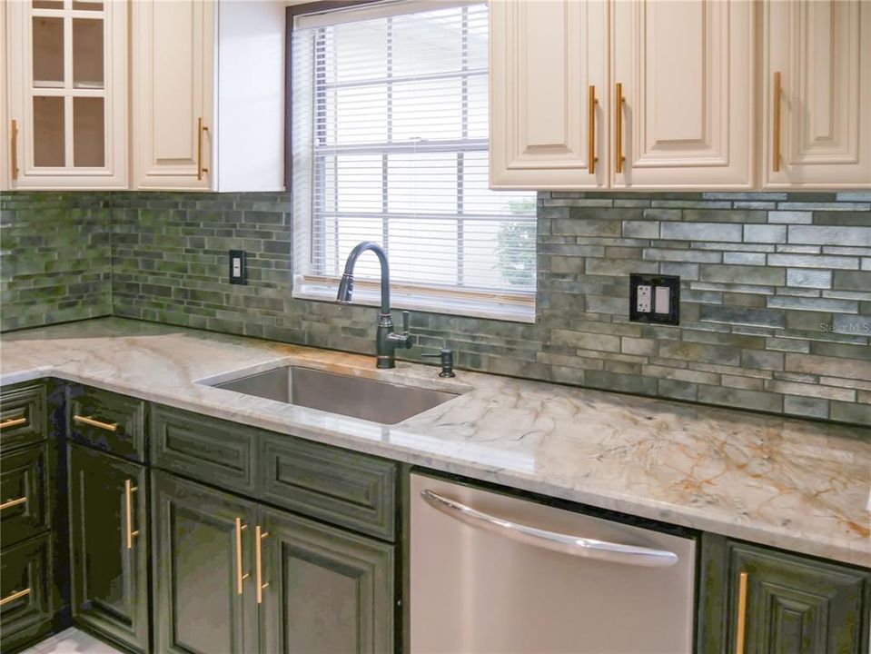 One of a kind granite in kitchen and full bath!