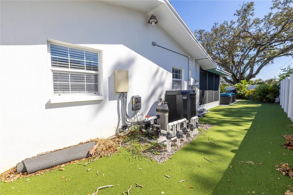 Right side of home with Astroturf