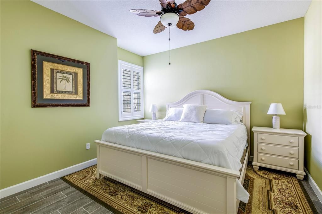 Bedroom 2, upgraded with Plantation shutters, upgraded with ceiling fan