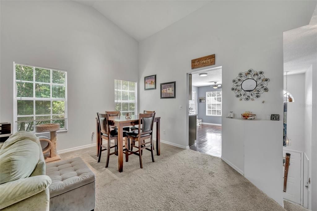 Dining area with view into the kitchen.