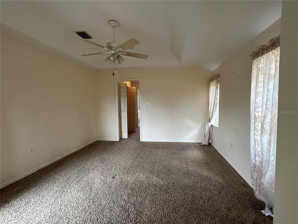 Master Bedroom w/sliders to lanai