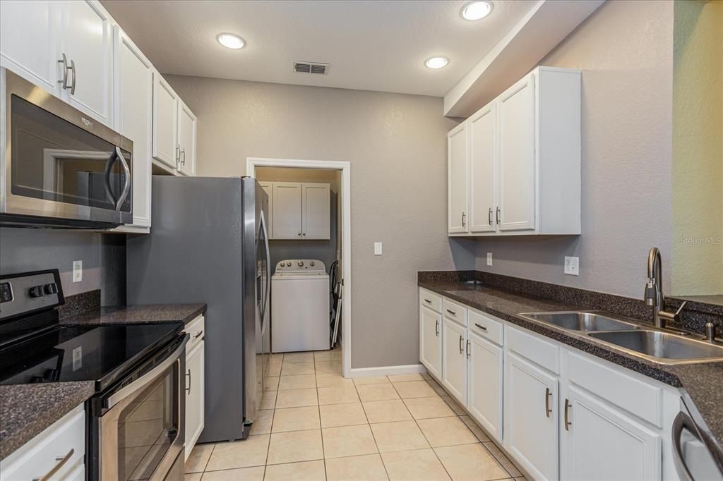 Kitchen leading to Laundry Room