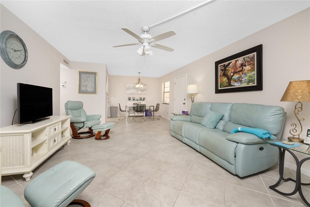 Looking into the living and dining area from the enclosed lanai.