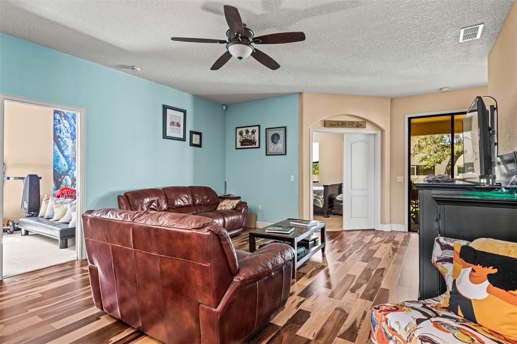 The living room welcomes all as the center of this floorplan.