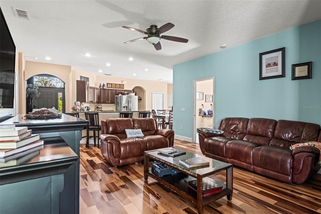 The living room is the center of the home where the split floorplan comes together to welcome all.