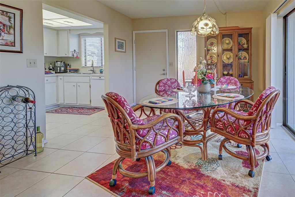 DINING AREA OFF OF KITCHEN - BRIGHT AND CHEERY!