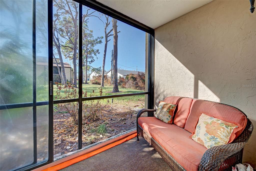 PATIO OFF OF PRIMARY BEDROOM WITH GLASS SLIDERS - COZY AND PRIVATE.