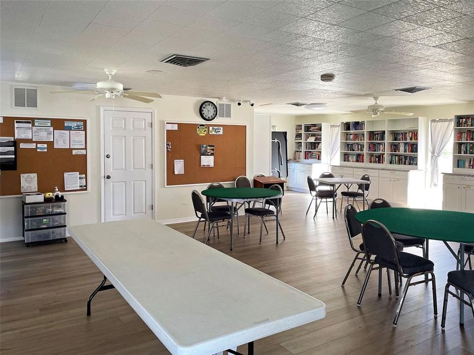 INTERIOR OF CLUBHOUSE - PLACE FOR CARDS AND PICKUP A GOOD BOOK TO READ WHILE YOU'RE THERE!