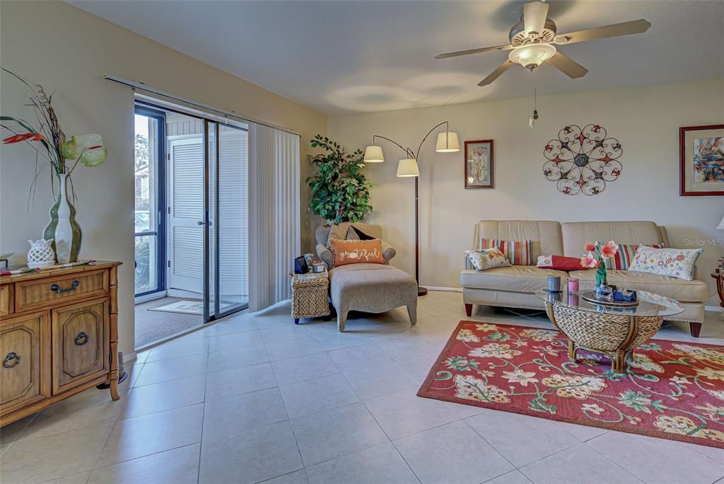 VIEW INTO LIVING ROOM AND OUT TO FRONT LANAI.