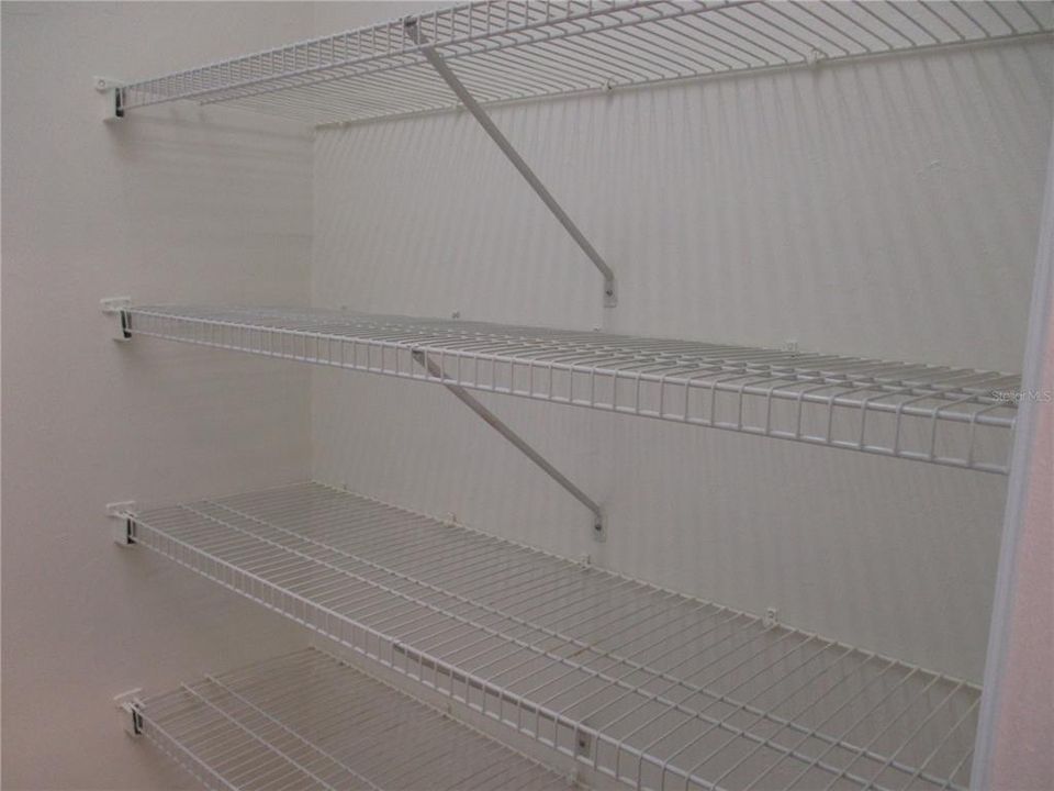 Pantry/storage shelves in Laundry room