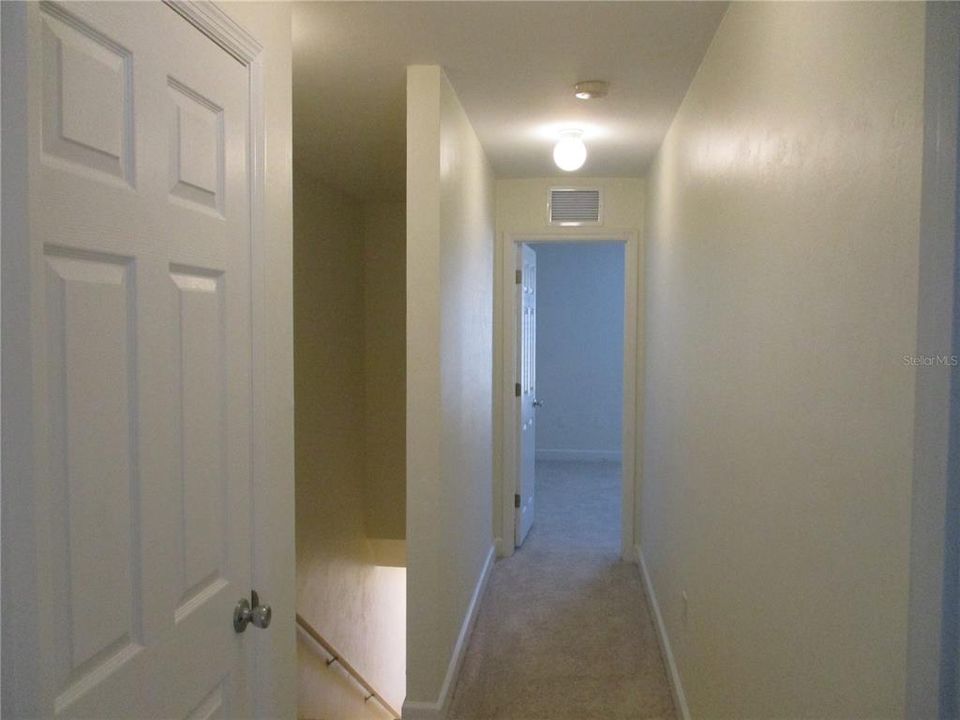 Hallway between bedrooms