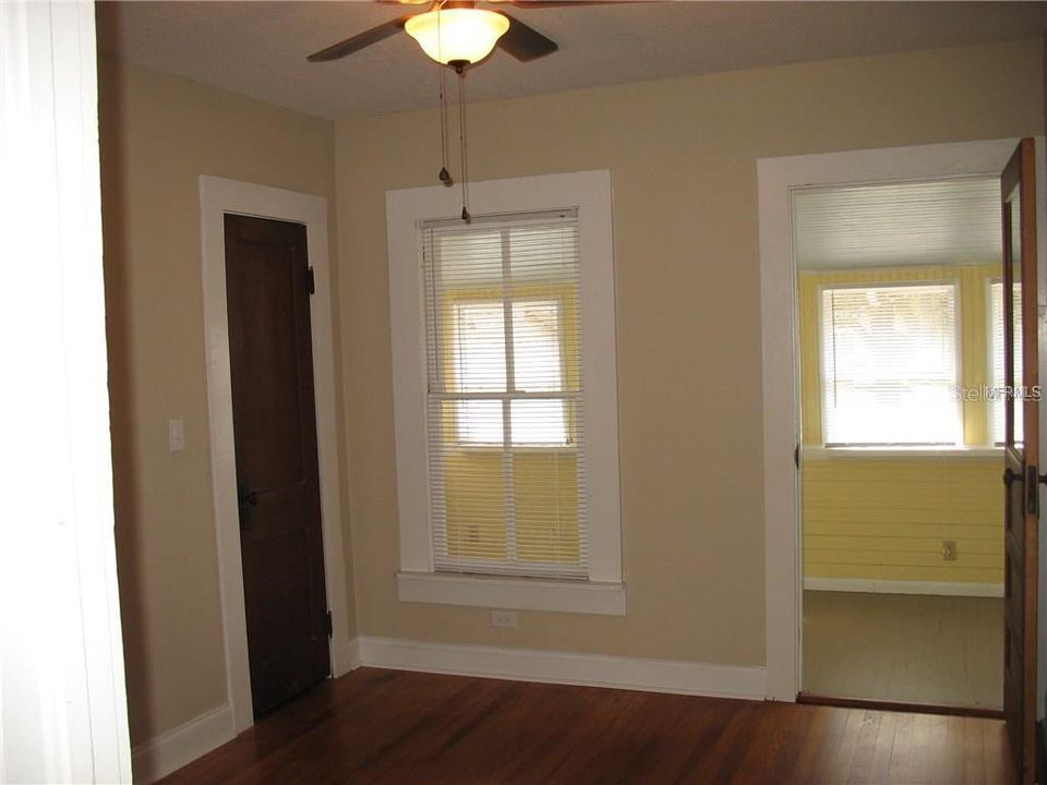 Bedroom 2 with closet and door to sun porch