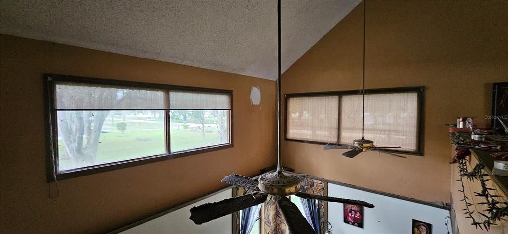 View of vaulted ceiling from upstairs