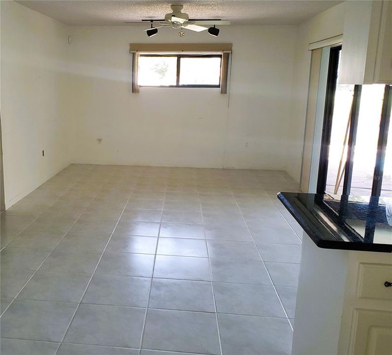 Family room off kitchen with pool access.