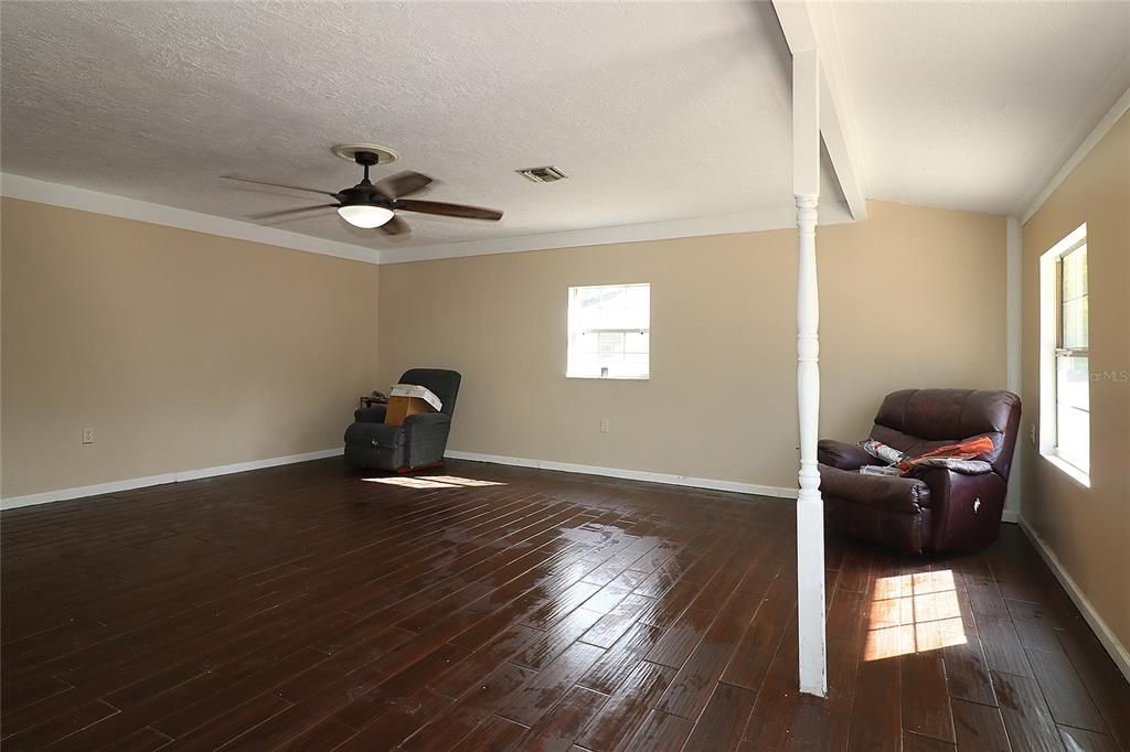 with tile floors & ceiling fan...