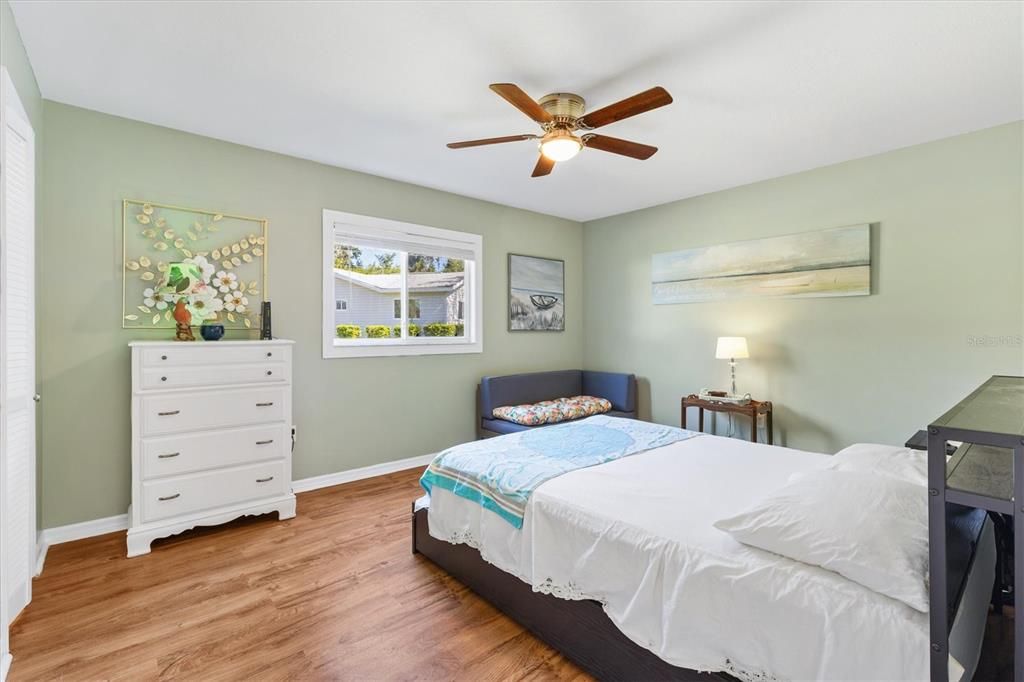 GUEST BEDROOM WITH A WALK IN CLOSET