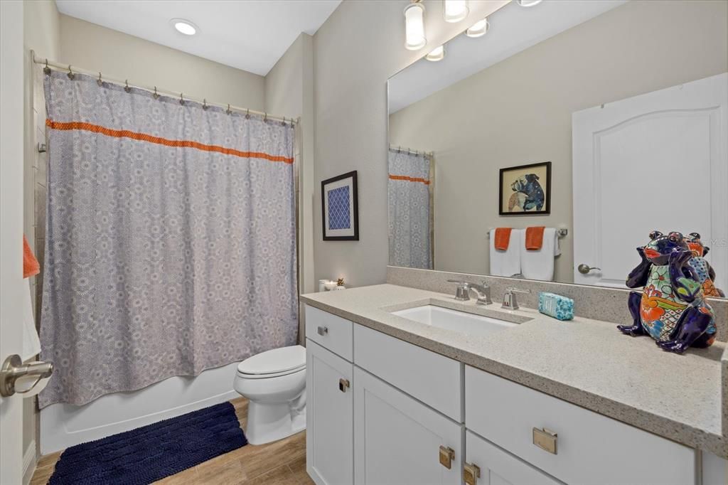 Guest bathroom with tub/shower combo