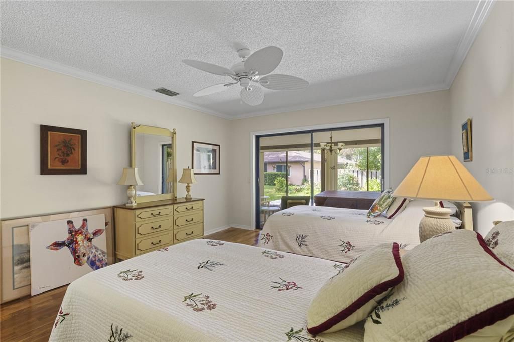 guest bedroom offers access on to the Florida Room