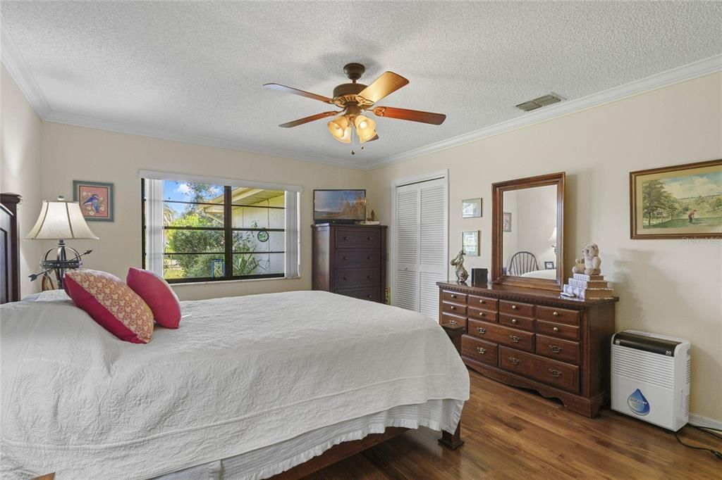 Primary Bedroom features a Walk-in Closet