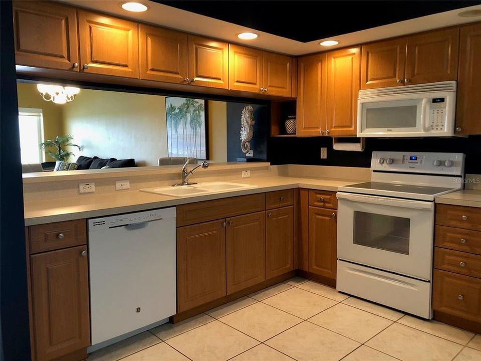 Well-appointed kitchen with breakfast bar.