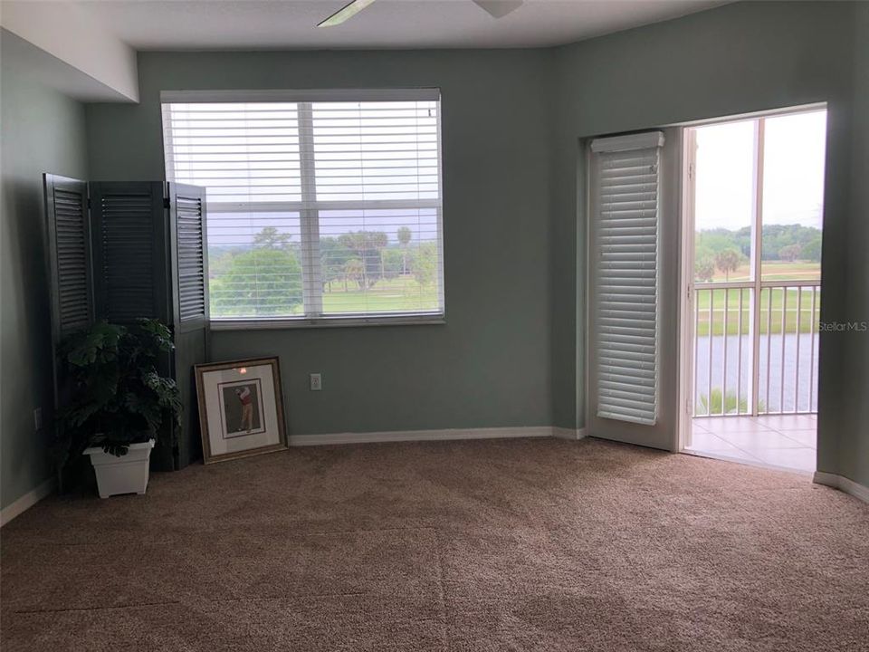 The master bedroom features lake and golf course views.