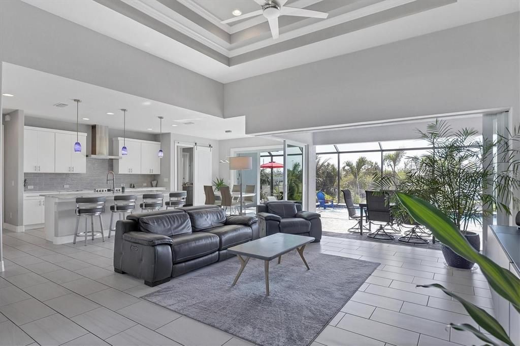 Open great room with contemporary tile flooring