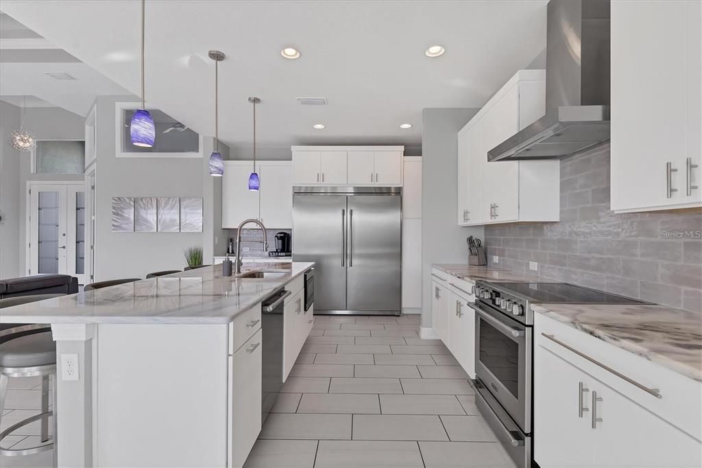 Modern kitchen Showcasing a 64" Double Door Fridge