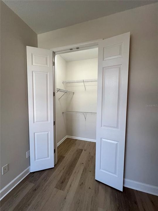 Guest bedroom walk in closet