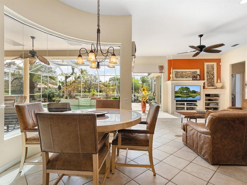 Kitchen nook overlooking pool patio and lake