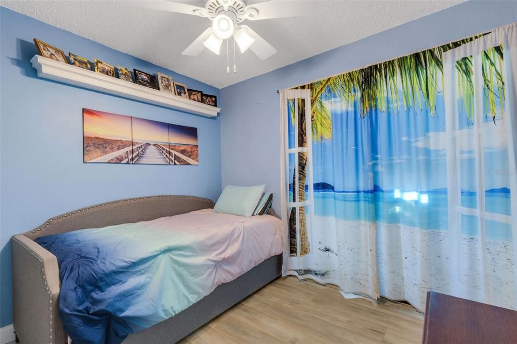 2nd Bedroom Towards Sliding Glass Doors to Bonus Room