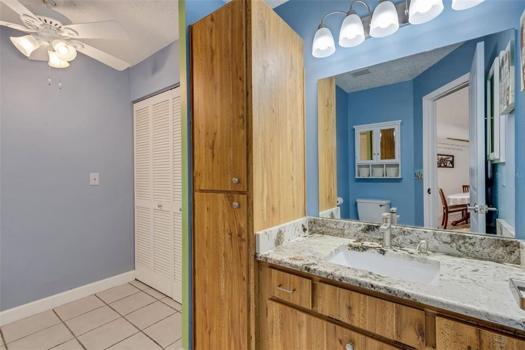 2nd Bathroom with Laundry Behind Door Doubles to the Left