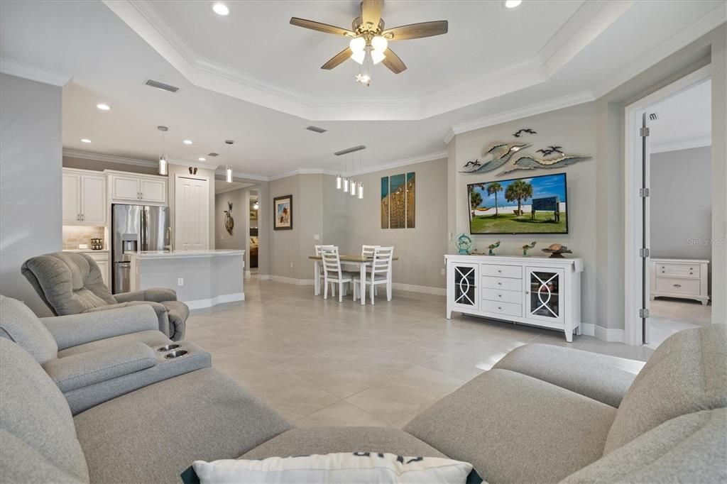 coffered 9' ceilings and a very spacious kitchen/ dining/ living room combination.