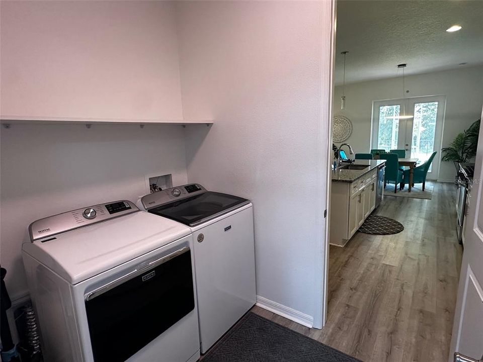 From the two car garage you will come into the home through a laundry room with washer and dryer.