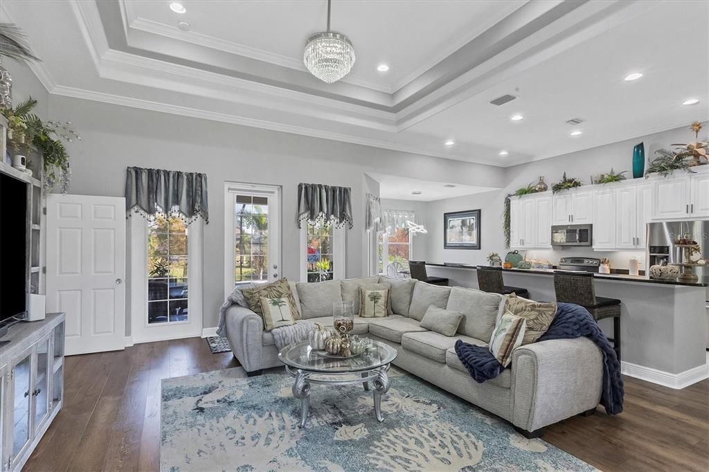 Living Room is highlighted with double tray ceilings accented with crown molding