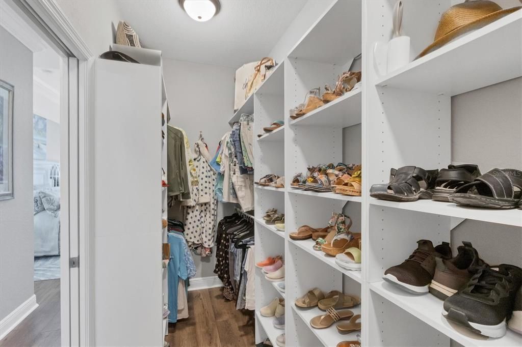 Master Suite custom shelving in walk in closet