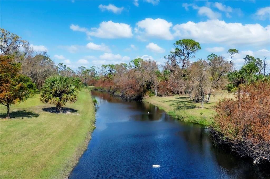 Gorgeous views overlooking a fresh water canal with lots of trees