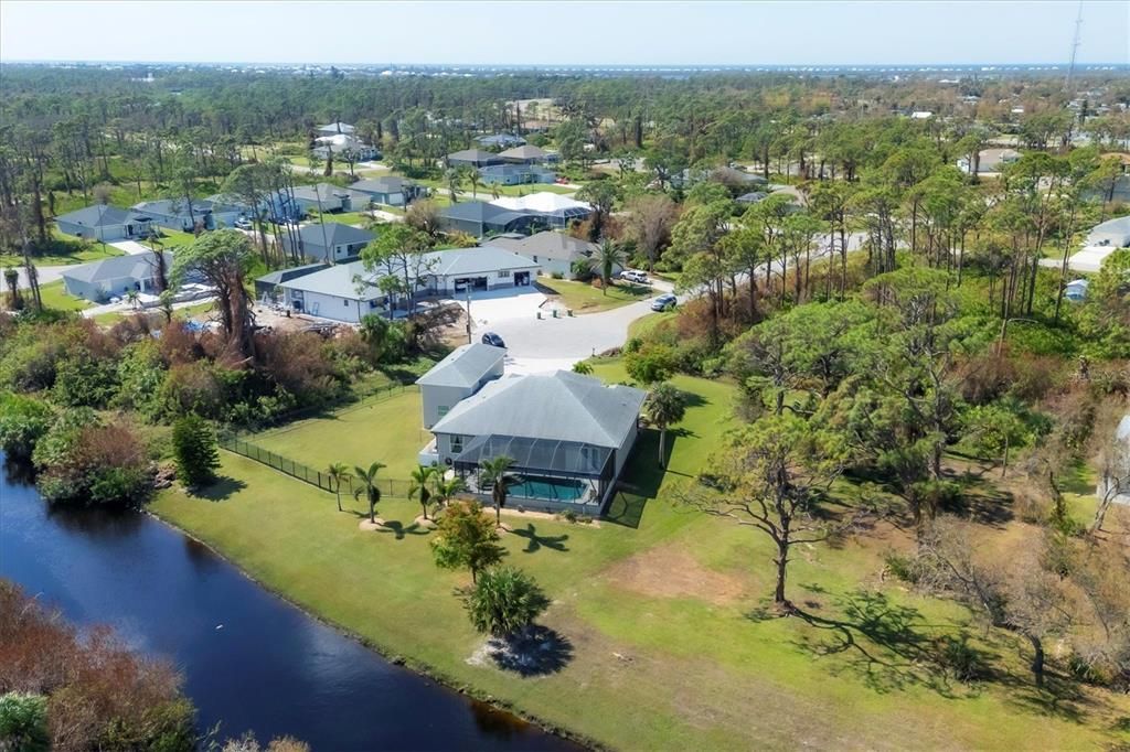 An abundance of trees & privacy come with this retreat