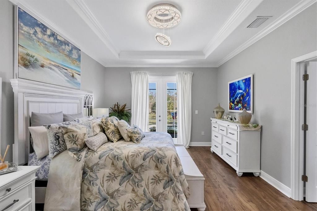 Master Suite is complimented with a tray ceiling & accented with crown molding