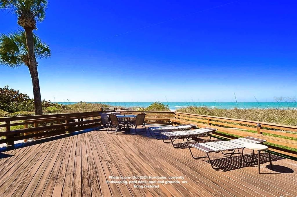 Pre Oct 2024 hurricane: former seaside deck will be rebuilt with composite decking (in budget & already ordered) ...much of the seaoats, seagrapes and vegetation in this photo will need to be replanted.