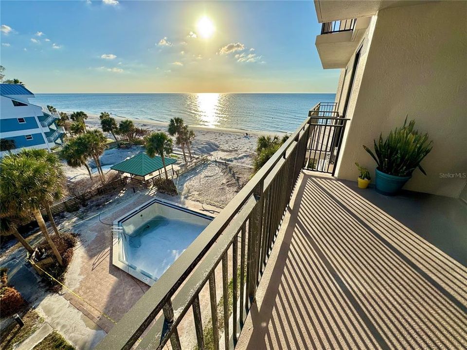 2 covered parking spaces included PLUS sunsets from your balcony nightly!