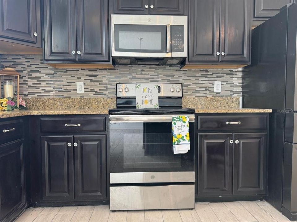 Kitchen with microwave and stove