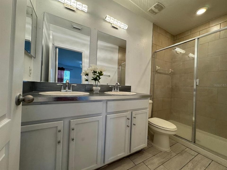 Bathroom 2:Two sink countertop, walk in shower