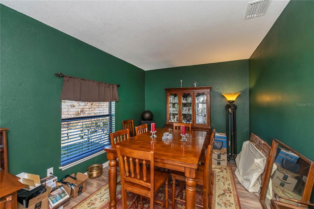 Bring your family and friends for a pleasant meal in this sizeable dining room with plenty of room for your hutch or other side pieces of furniture.  This is a real plus!