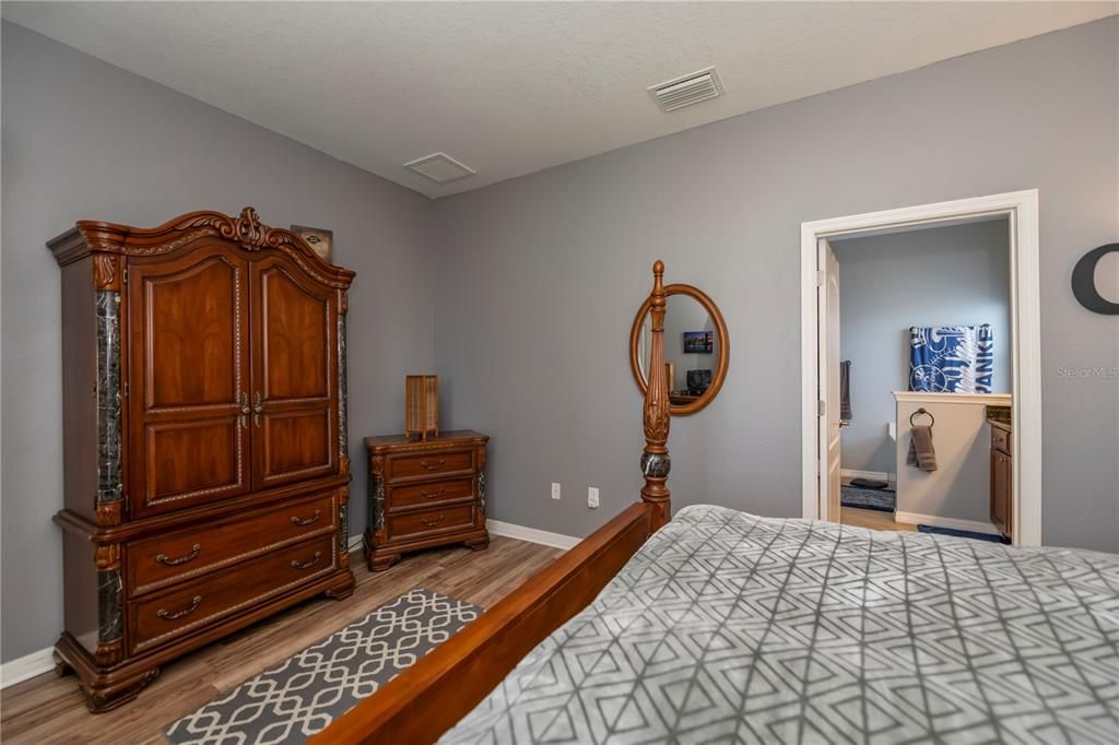 Plentry of room in the primary bedroom for a large King bed plus dressers and chests.