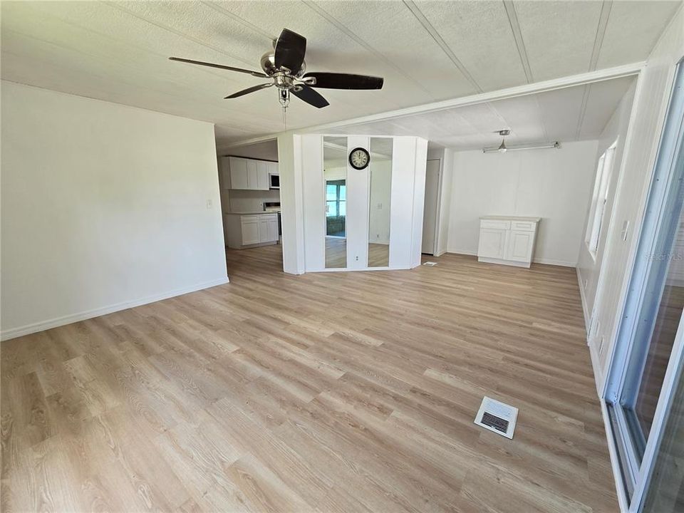 View from living room towards dining room and kitchen