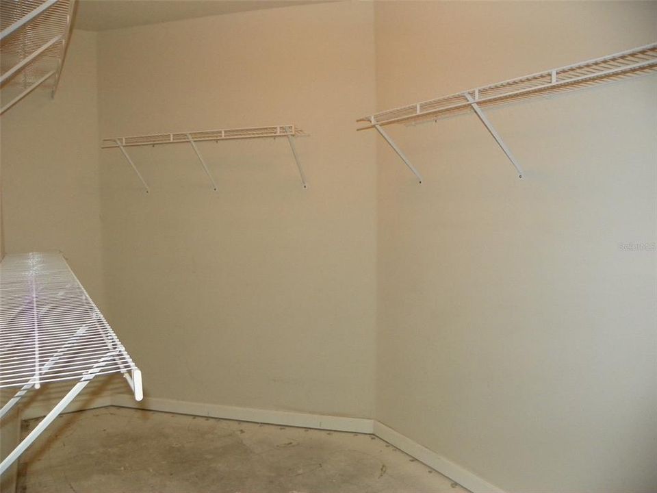 Primary Bedroom Walk in Closet