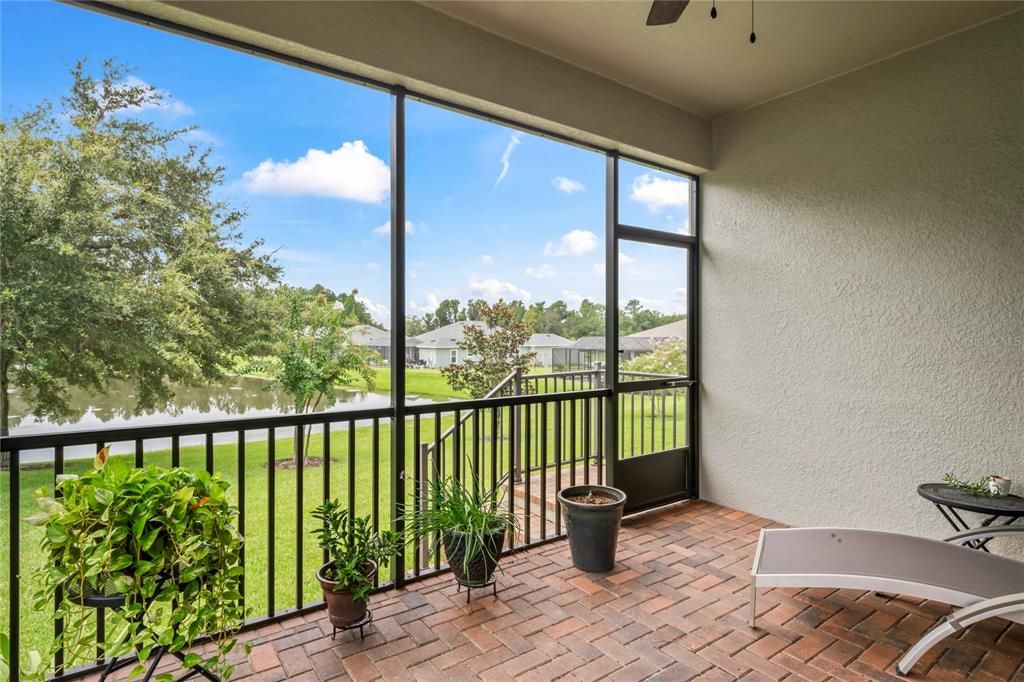 back porch screened enclosure with pavers