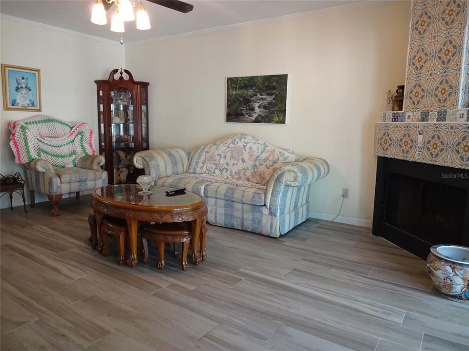 Living room overlooking large screened porch