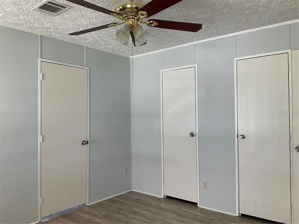 Master bedroom with his &hers closets