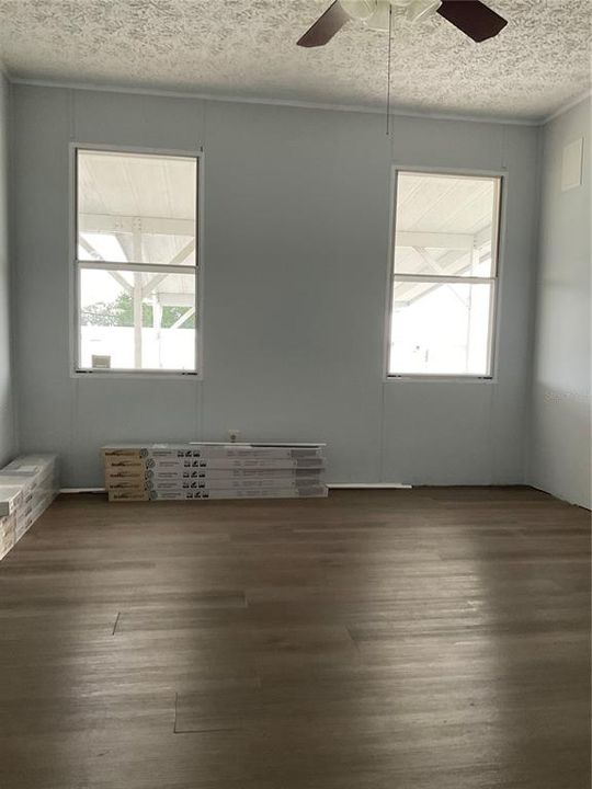 Master bedroom with extra laminate flooring